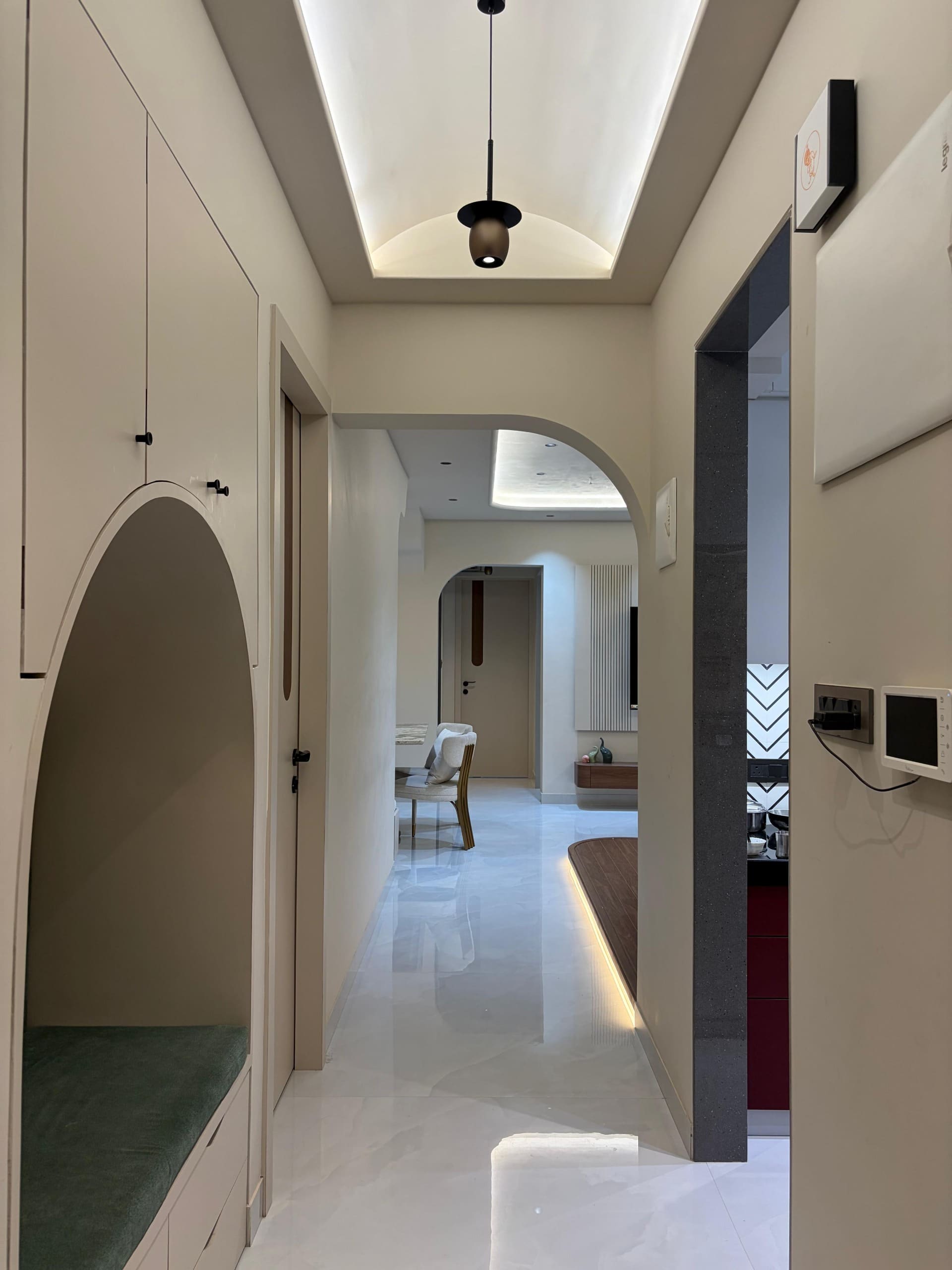 Entrance with sculpted arches and marble